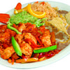 Chicken fajitas come with rice, beans, guacamole, and your choice of tortillas. 